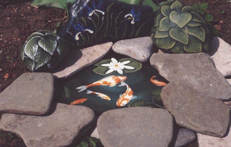 Koi_pond_with_iris_and_hostas