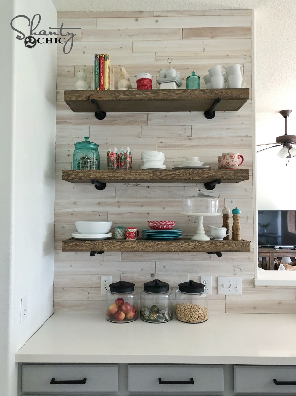 DIY-Floating-Shelves-with-Pipe-Brackets